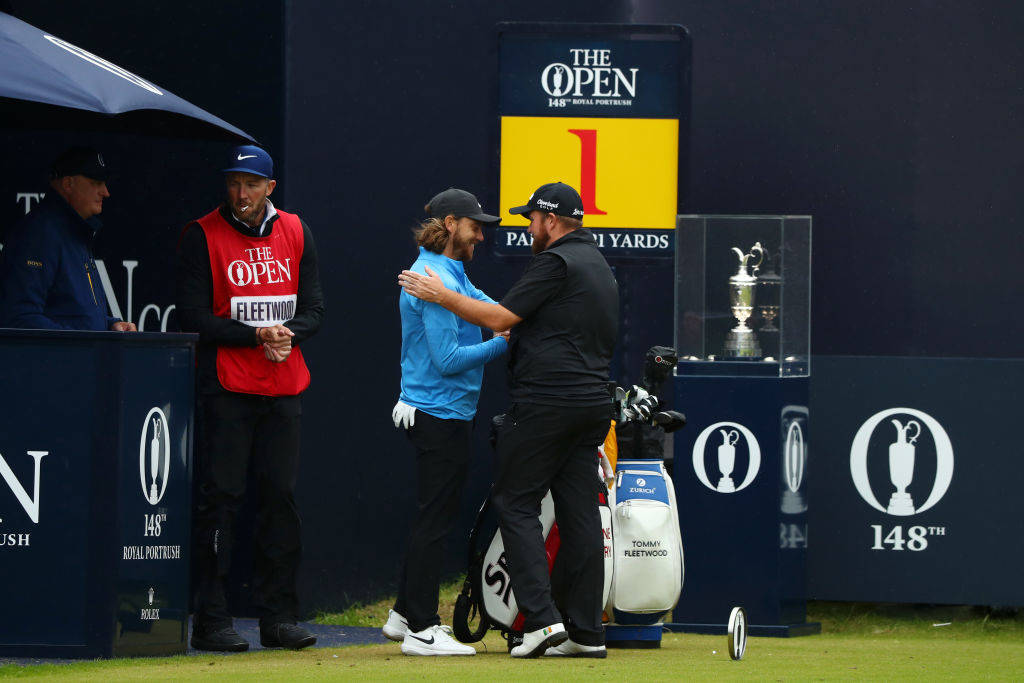 Tommy Fleetwood and Shane Lowry embracing ahead of their final round